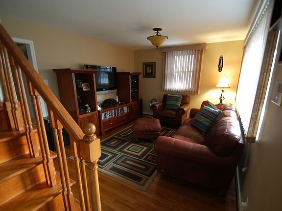 Warm sunlight invites you to the pleasant living room and charming dining room