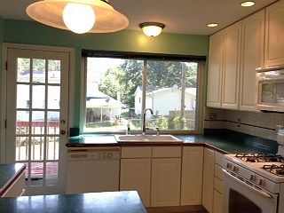beautiful kitchen with lots of lights