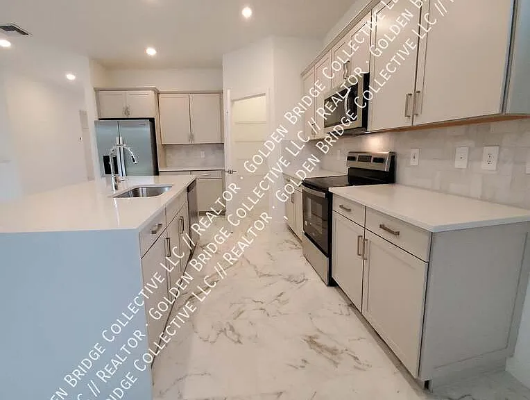 1949 NE Ocean Dunes Dr — Photo 2