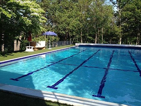 One of the largest pools in CT: 60' x 30' with child-friendly cushioned turf deck, and pool house with 2 bathrooms / changing areas and a bar room with audio system.