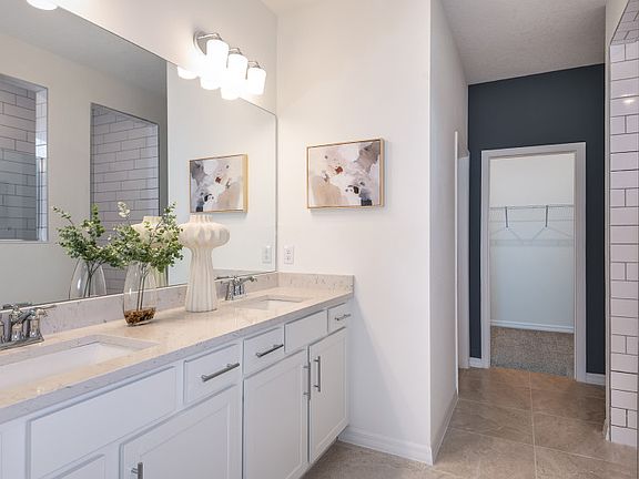 Owner s Bath with Dual Sinks and Walk-In Shower