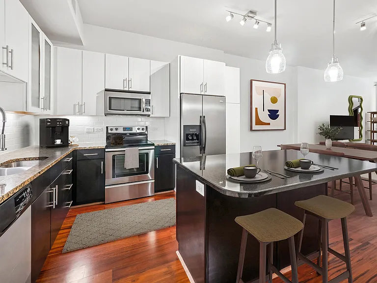Experience luxury living with this beautifully designed kitchen and open living area. Experience luxury living with this beautifully designed kitchen and open living area.