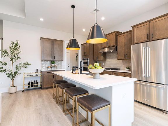 Well-equipped kitchen with ample cabinet space and a large center island