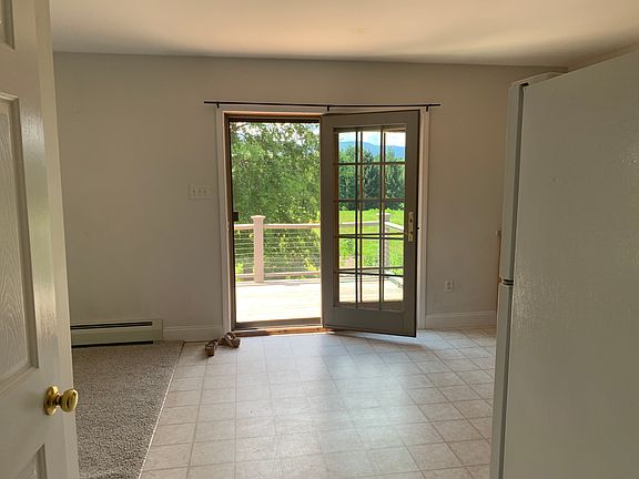 View of Kitchen and Deck from Hallway