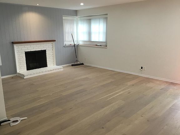 Family room w new hardwoods and led can lights thru out the house