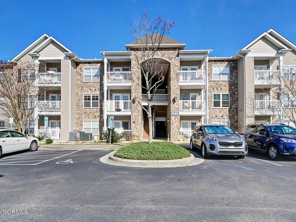 1st image of 645 Condo Club Drive Unit 201