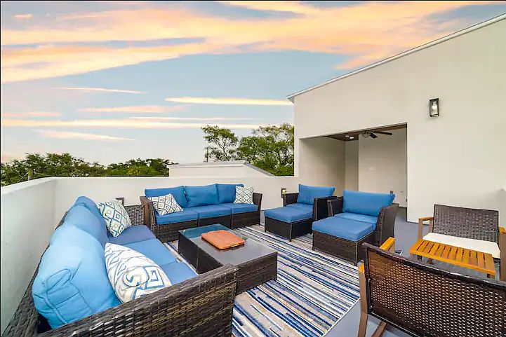 Relaxing, stylish rooftop patio area with plenty of seating for your entire group to hang out at the end of the day and enjoy an evening cocktail.