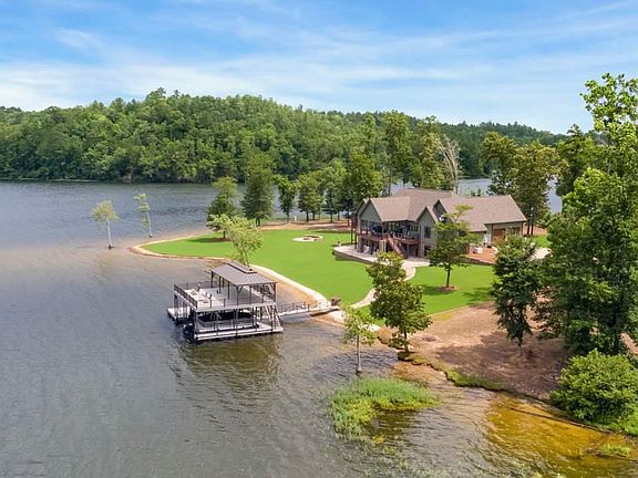 Image 2: Experience "Life In Paradise" Surrounded by Beautiful, Breathtaking Lake Views in this One-Of-A-Kind Estate Home with 367 Feet of Waterfront.