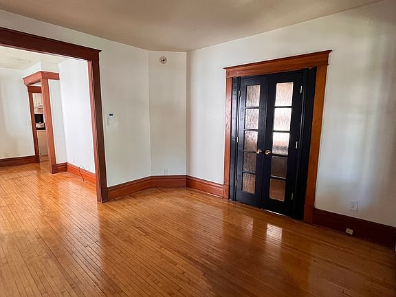Living room leads into the sun-filled dining room.