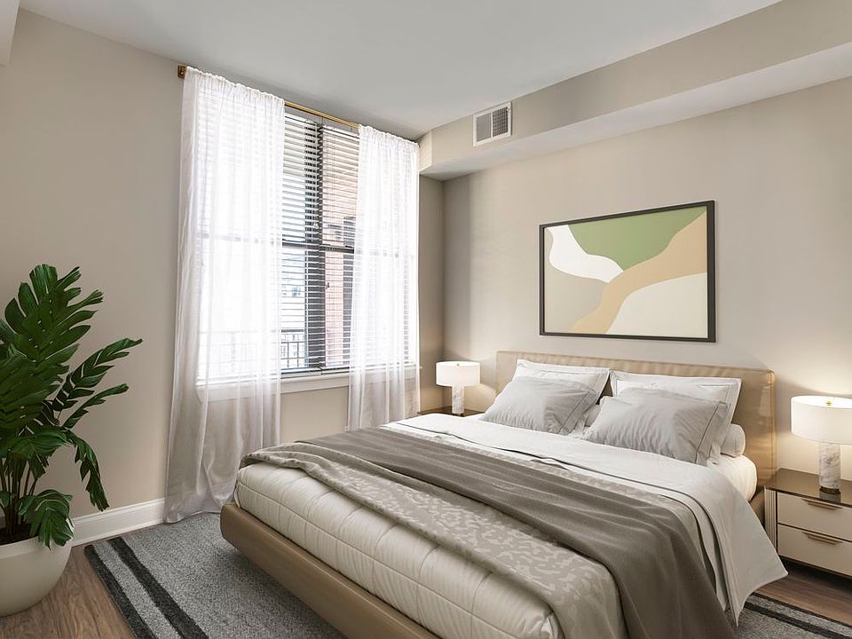 Renovated Package II bedroom with hard surface flooring