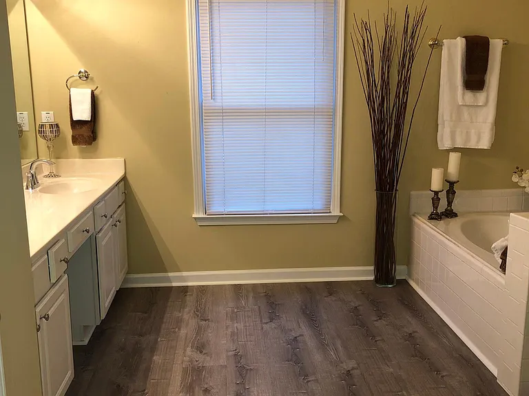 Master bath with separate shower and soaking tub.