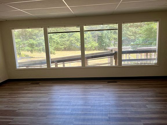 Wall of windows for natural light and view.