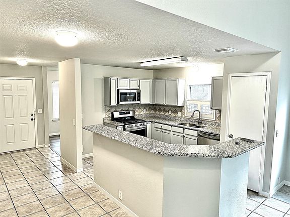 3rd image of 10214 E Summit Canyon Dr