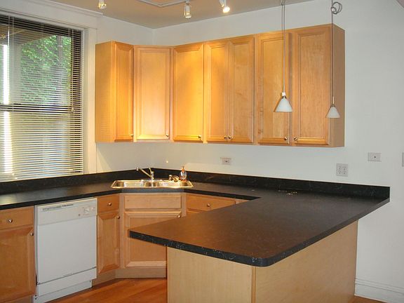 BIG KITCHEN ISLAND OPEN TO LIVING ROOM
