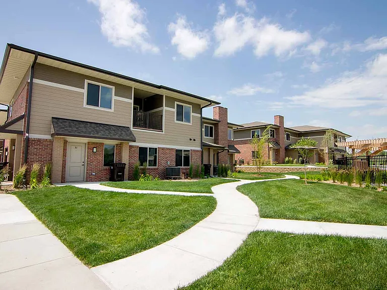 Step outside to professionally landscaped grounds and scenic walking paths right outside your door.