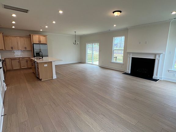 Open concept living, dining and kitchen