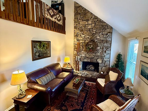 living room w view of upstairs loft area