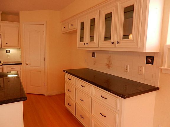 Lots of work space and glass front cabinets plus big pantry