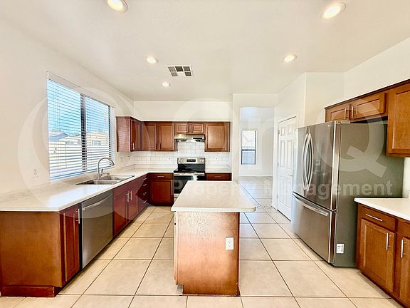 5th image of 9940 E Medina Ave