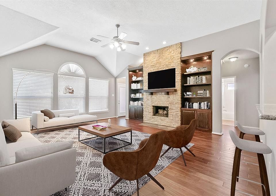 Virtually staged family room.