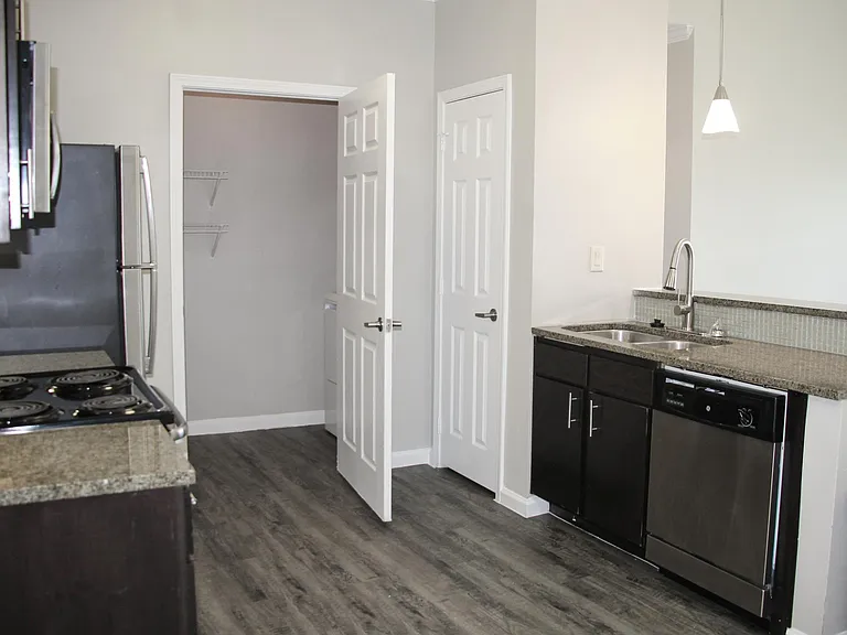 Kitchen with stainless steel appliances.