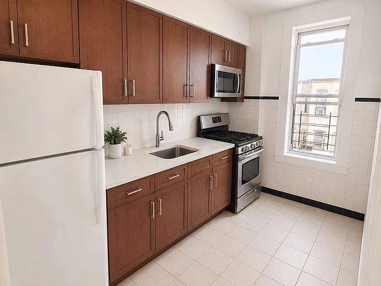 6137 Gates Ave #2F — Photo 1