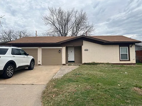 6441 NW Compass Dr Photo 1