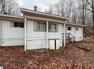 8261 Whispering Pines Dr, Mancelona, MI 49659