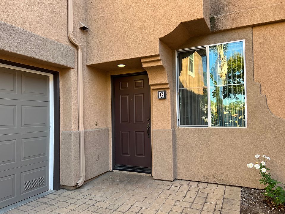 Front door next to garage (with direct access from garage into the unit)