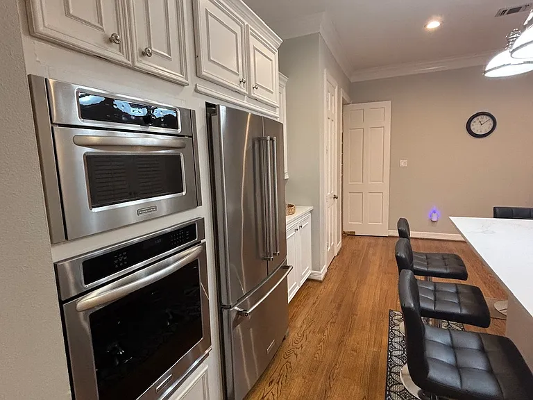 View of kitchen from garage entry