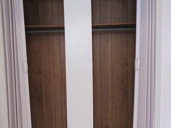 Hall closest with new accordion doors.