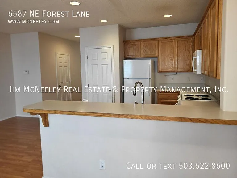 6587 NE Forest Ln — Photo 8