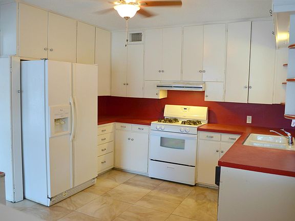 Kitchen includes all the appliances: Refrigerator, gas stove and dishwasher.