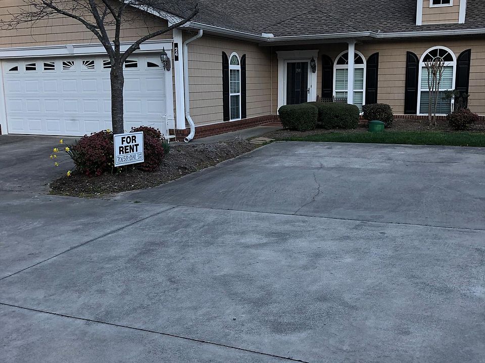 Two car garage and front entrance.
