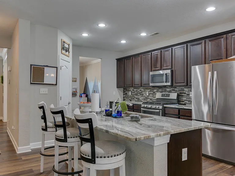 Photos shown are from a nearly identical property/listing and are provided for representative purposes only. Photos do not depict the exact subject property. Actual finishes, condition, layout, features, and details may vary.