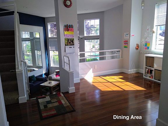 Dining area with living room in the background