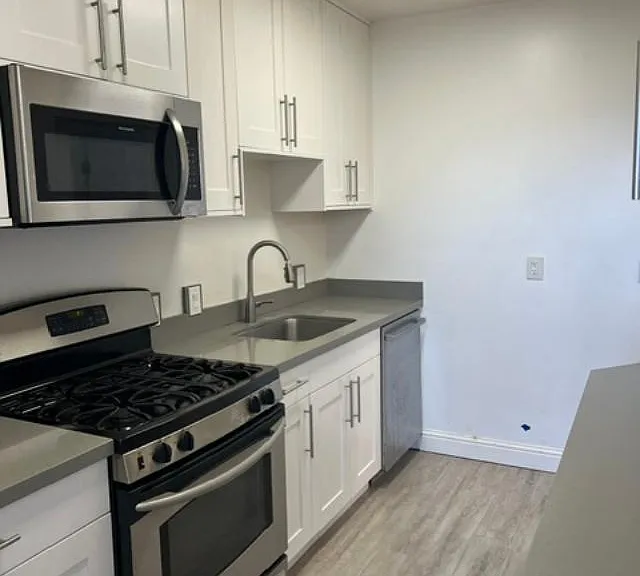 Kitchen view 1, Full kitchen for those who love to cook. Microwave, stove, oven and refrigerator included.