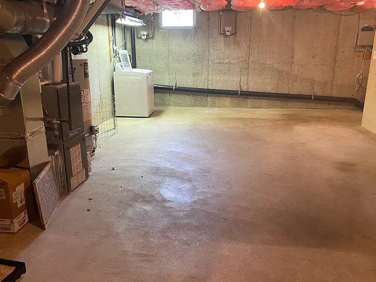 basement with washer and dryer - use as a hangout!