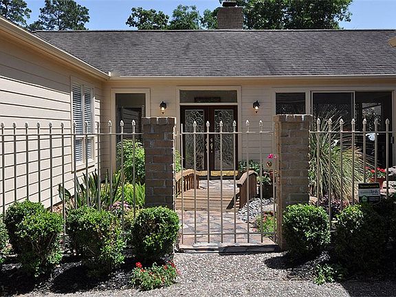 RARE ONE STORY CUSTOM BUILT WITH GATED COURTYARD