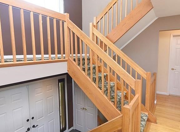 Dramatic entry foyer leads you into this sun filled home.