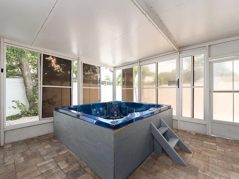 Hot tub conveys with the home.