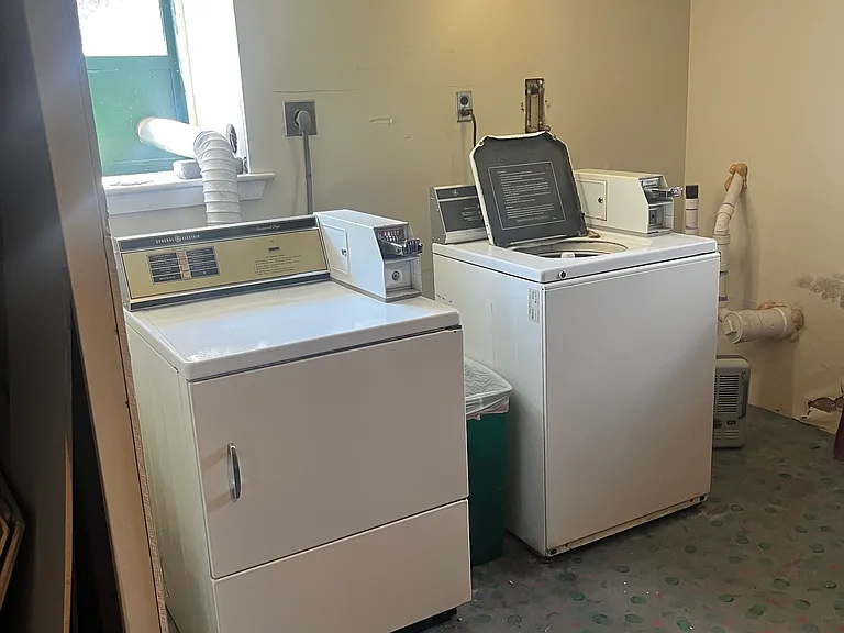 Shared coin-op washer and dryer in the basement