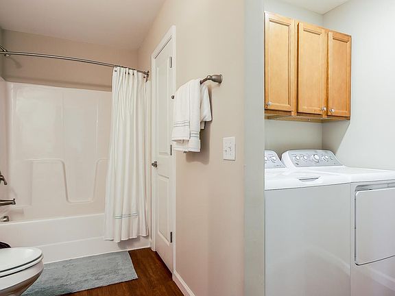 Separate laundry area off of the guest bathroom