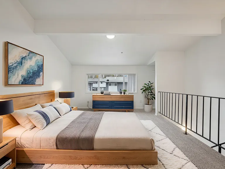 Experience tranquility in this spacious and elegantly designed bedroom. Experience tranquility in this spacious and elegantly designed bedroom.