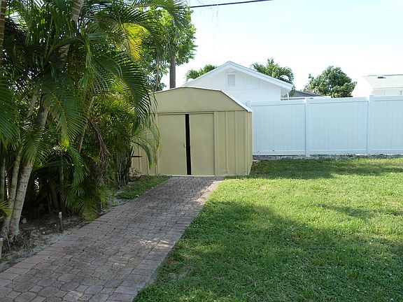Private yard with shed