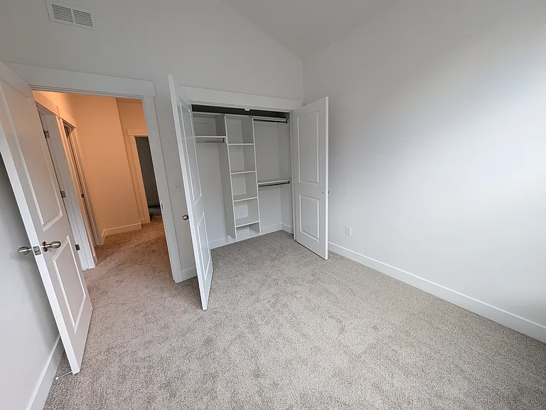 All bedroom closets have built-in shelving units.