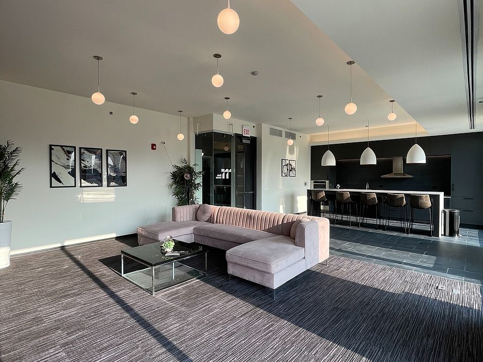 Residents' Lounge with Large TV, Fireplace, and Gourmet Kitchen