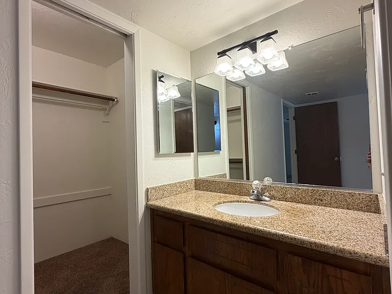 Bathroom #2 vanity and closet view