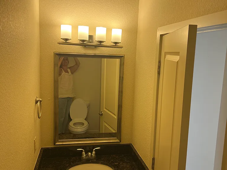 Powder room off of main living area for guests