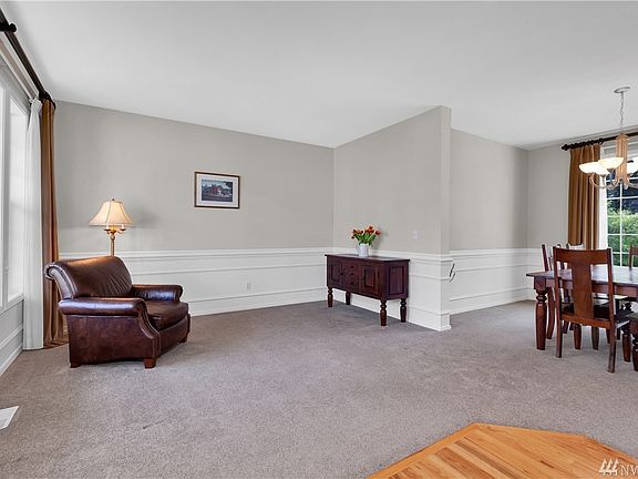 Formal living & dining rooms with wainscoting